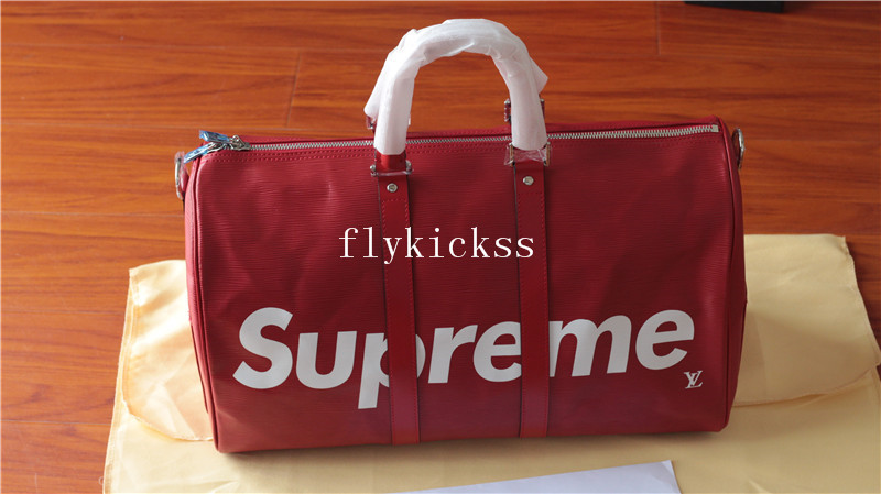 Supreme LVS Traveling Red Duffle Bag